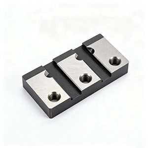 Carbon steel CNC machined bracket with milled pockets and tapped holes