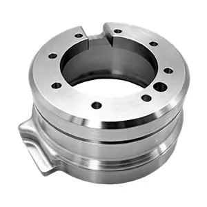 Low-volume CNC machined rotor housing with concentric grooves and bolt holes