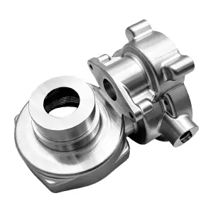 Prototype CNC machined flanged connector with threaded port and smooth finish