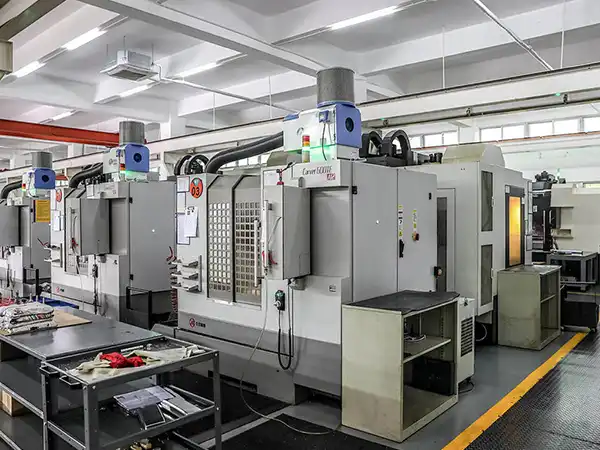 Operator performing CNC quality check using TESA height gauge for accurate dimensional inspection