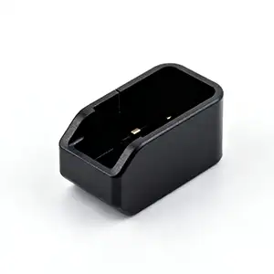 Black plastic component with deburred edges, ready for final installation.