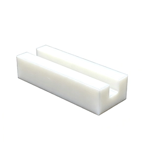 White POM (Acetal) CNC machined gear showing wear resistance and durability