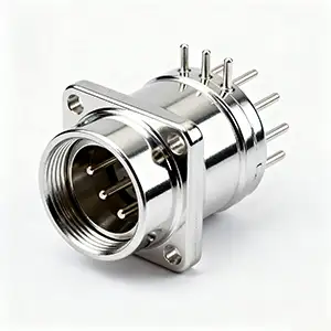 Silver-plated CNC connector with smooth and polished surface finish.